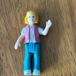 Fisher Price vintage sweet streets little girl figurine. Moveable legs.